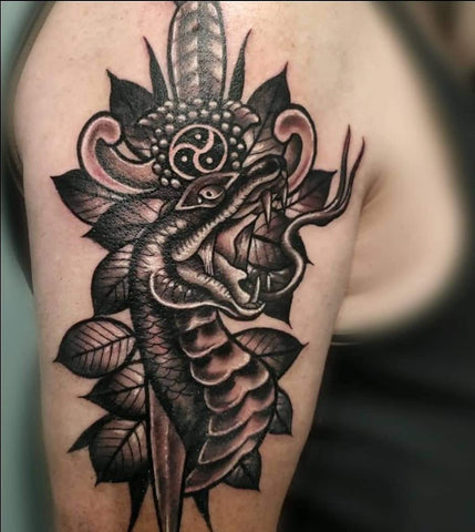 Neo traditional snake and dagger tattoo